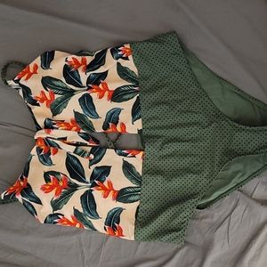 One piece swim suit, 3xl by bodyglove in a flower print, never worn